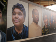 Portraits of people from the Windrush exhibition in the Senedd