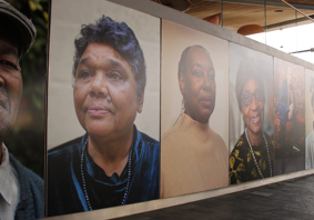 Portraits of people from the Windrush exhibition in the Senedd
