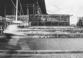 blurry cyclist outside the Senedd